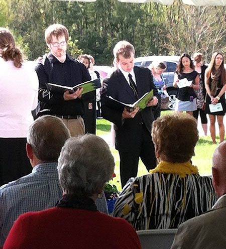 Students pay tribute during the 2013 Memorial service.