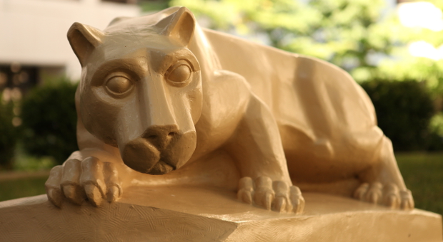 Penn State College of Medicine's Nittany Lion mascot is seen in a statue in the College's courtyard in 2014.