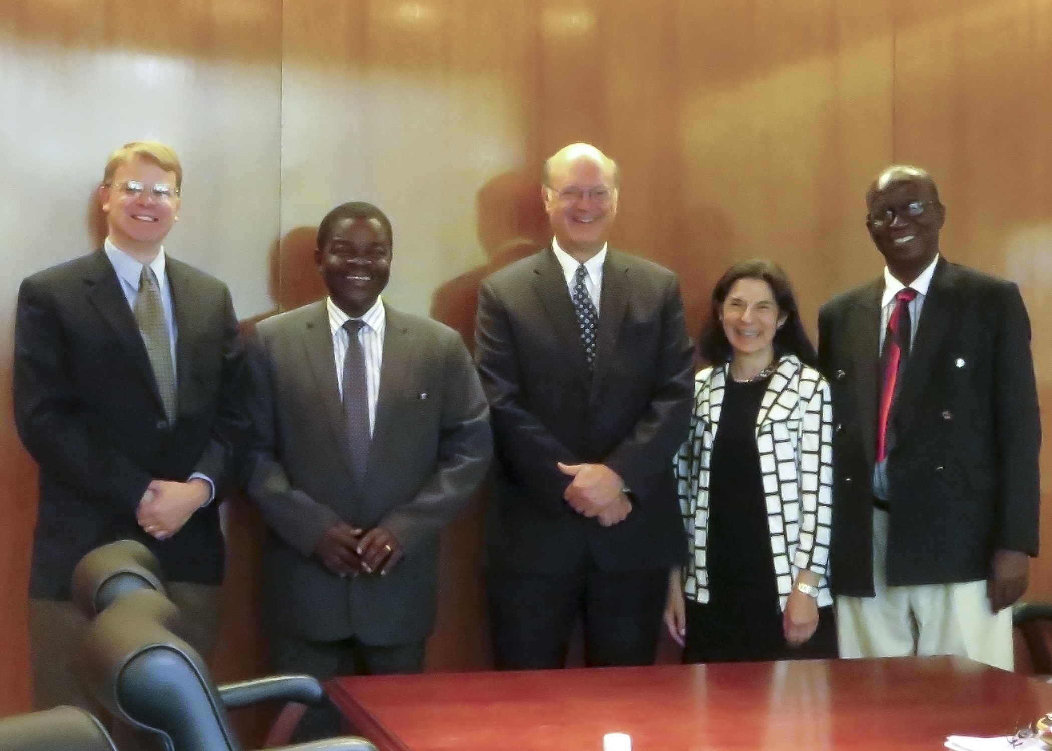 From left, Dr. Ben Fredrick, director of Global Health Center;  Kwaku Ansa-Asare, founder of MountCrest University, Ghana; Dr. Craig Hillemeier, CEO of Penn State Milton S. Hershey Medical Center, Penn State's senior vice president for health affairs, and dean of the Penn State College of Medicine; Dr. Terry Wolpaw, vice dean for education; and  Dr. Samuel Akortey Akor, dean of the MountCrest Medical School in Ghana.