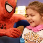 Superheroes deliver capes to young patients at Children™s Hospital