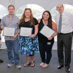 Several Penn State College of Medicine graduate students were honored Aug. 19, 2016, with the Graduate Alumni Endowed Scholarship and the Class of 1971 and 1974 Awards. Pictured are award recipients Nick Parekh, Phillip Domeier, Dan Hass, Caitlin Nealon and Mandi Feinberg with Charles Lang, PhD, Interim Associate Dean for Graduate Studies and Distinguished Professor. The students are pictured in an outdoor event tent with Dr. Lang at right. All students are holding certificates and smiling.