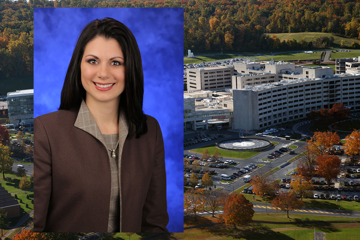 Jennifer Meka, PhD, MSEd, has been named inaugural director of Penn State College of Medicine's new Woodward Center for Excellence in Health Sciences Education. Meka is pictured wearing a dark jacket and tan blouse, standing in front of a blue photo background. Her photo is superimposed on an image of the Penn State College of Medicine crescent.