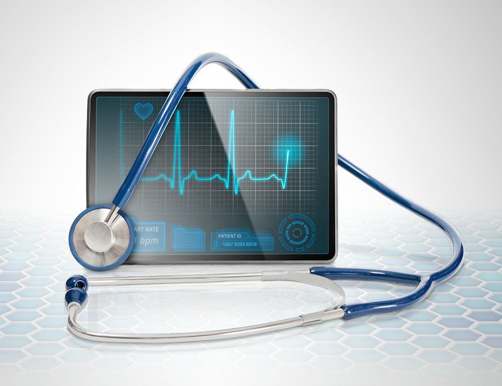 Medical tablet showing cardiogram on display and a blue stethoscope, on futuristic background background.