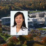 Eunice Chen, an MD/PhD student at Penn State College of Medicine, recently received a National Cancer Institute F30 award for her project titled "Mechanistic studies of genomic RNA dimerization in an oncoretrovirus." Chen is pictured wearing a white lab coat against a white photo background, and her photo is superimposed on an aerial view of the College of Medicine's campus in Hershey, PA.