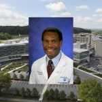 An aerial view of the Penn State Hershey campus is in the background. Placed over top in the center is a photo of Dr. Dwight Davis, who's wearing a tie and white physician's coat and posing in front of a blue backdrop.
