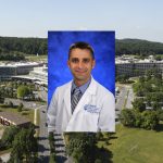 A stock photo of Dr. Jed Gonzalo wearing a white coat in front of a blue backdrop; superimposed over an aerial shot of the Milton S. Hershey Medical Center-Penn State College of Medicine campus.