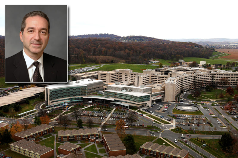 An image of Dr. Tony G. Farah superimposed over the upper left-hand corner of a photo of the Milton S. Hershey Medical Center campus.