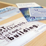 A promotional image for Penn State Clinical and Translational Science Institute shows a number of pamplets and cards advertising CTSI services fanned out on a table. The CTSI logo is visible on a wall in the background.