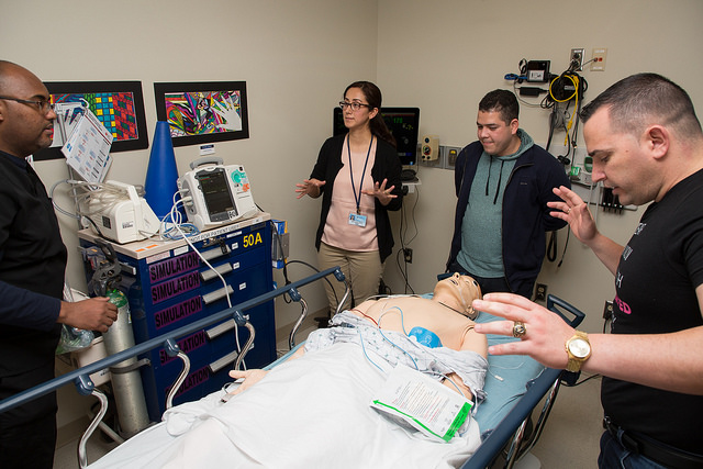 Participants of the International Medical Graduate Program work together on a cardiology lab exercise.