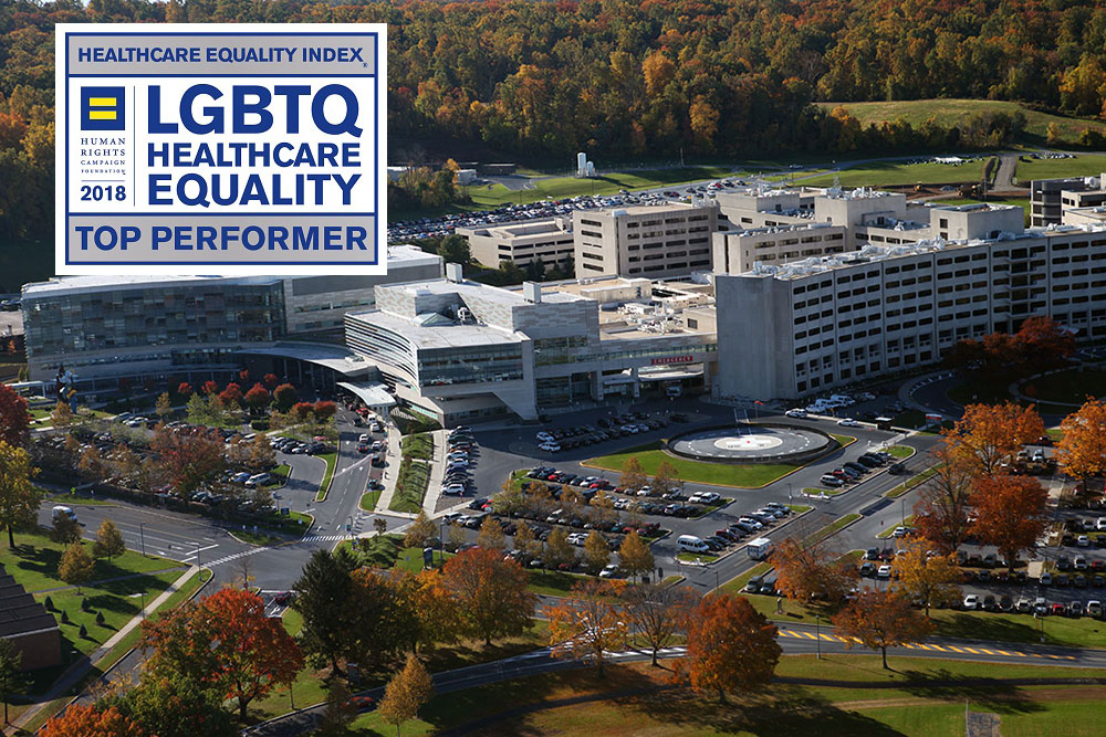 An aerial view of Penn State Health Milton S. Hershey Medical Center in Hershey, PA, is seen with the logo for the Human Rights Campaign 2018 Healthcare Equality Index superimposed at the top let. The logo features the words Healthcare Equity Index, Human Rights Campaign Foundation 2018, LGBTQ Healthcare Equality, Top Performer.