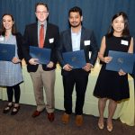 Dr. Leslie Parent, Vice Dean for Research and Graduate Studies at Penn State College of Medicine, left, is seen with the recipients of the Dean™s Award for Scholarly Achievement during the 2018 Commencement Awards. Recipients were Robert Feehan, Prashanth Gokare, Amanda Miller and Cong Xu. The five are pictured standing in a line, with the students holding award folios.
