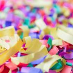 An A close-up photo shows colorful paper confetti.