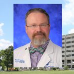 Dr. Ronald Miller, a nephrologist at Penn State Health Milton S. Hershey Medical Center, is the July winner of Penn State College of Medicine™s Exceptional Moments in Teaching program. A head-and-shoulders professional photo of Miller wearing a medical coat is seen superimposed on a picture of the front of the College' Crescent Building in Hershey, PA.