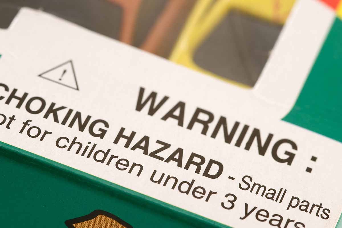 Warning label on toy reads: WARNING: CHOKING HAZARD – Small parts not for children under 3 years with a triangle and an exclamation mark in the middle.