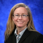 A head-and-shoulders professional photo of Sue Grigson
