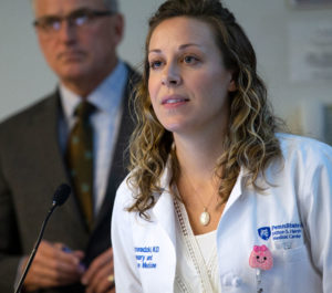 Lisa Domaradzki, a Pulmonary/Critical Care Medicine Fellow, gives an oral presentation at Resident and Fellow Research Day 2019 at Penn State College of Medicine, as Dr. Kent Vrana looks on.