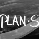 The image shows a chalkboard with the words "Goal Plan Success" written on it.