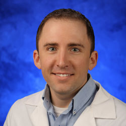 A head-and-shoulders professional photo of Michael Dennis, PhD