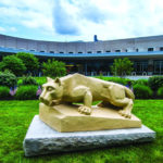 At statue of the Penn State Nittany Lion on grass on the grounds of Penn State Health St. Joseph Medical Center