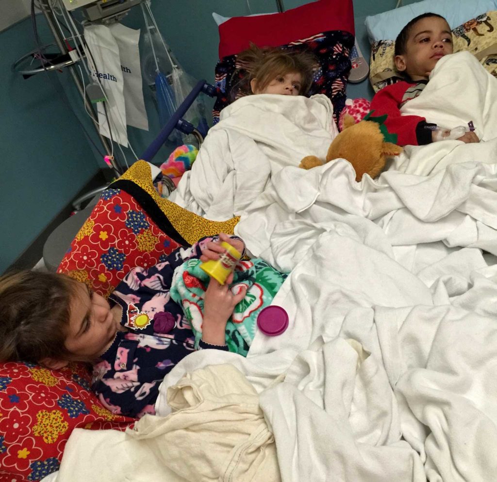 A photo of three children who were brought into Penn State Health Children's Hospital due to neglect and abuse.
