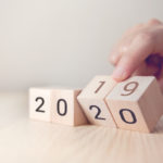 The image contains blocks with the numbers 2019 being turned to 2020.