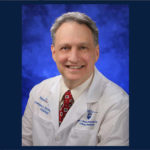 The logo for Penn State Clinical and Translational Science Institute 5 Questions series and a head-and-shoulders professional photo of Dr. Larry Sinoway are seen next to each other.