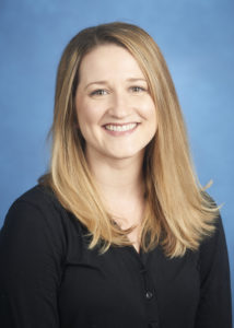 A head-and-shoulders professional photo of Tracy Raulston