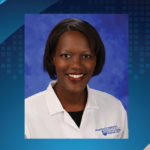 A head and shoulders professional photo of Dr. Rebecca Phaeton, a black woman, is superimposed on the lion.