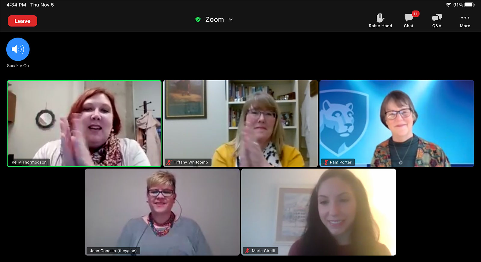 A screenshot from a Zoom webinar shows the faces of five people - four women and one nonbinary person - from their video.
