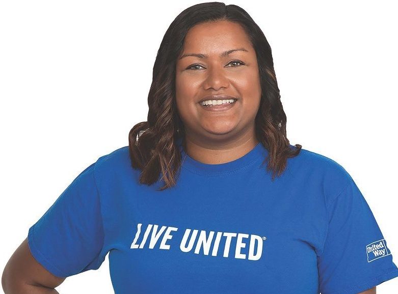 A poster of a girl wearing a T-shirt with “Live United” printed on it. The image also says, Thank you for supporting United Way.