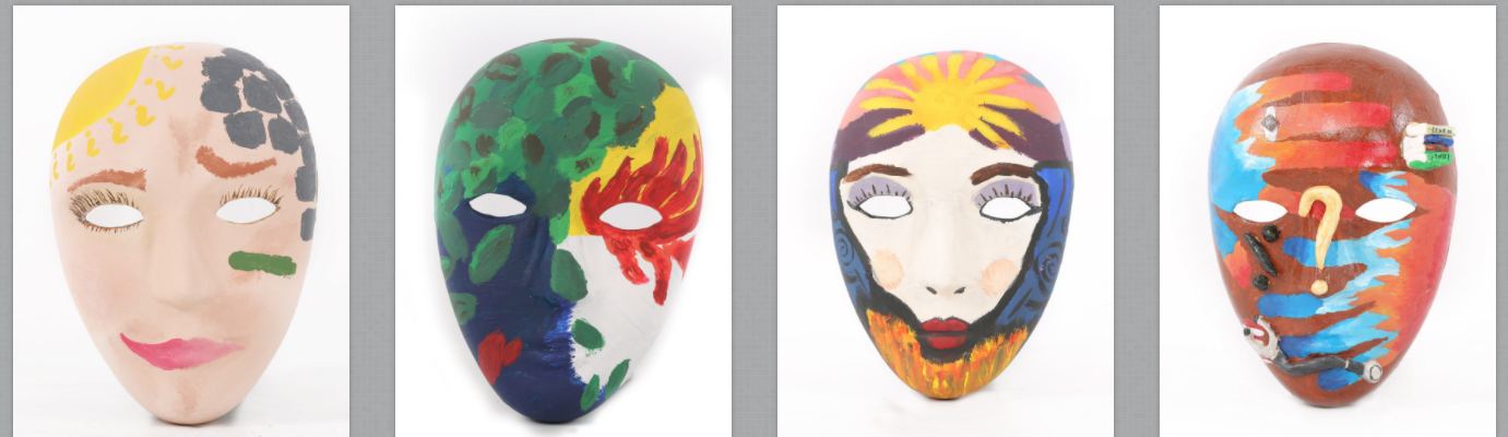Four brightly painted full-face masks with eyeholes are seen, depicting the outer identities of their creators.