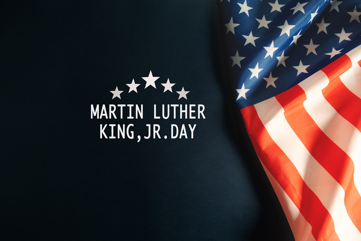 An illustration features an American flag and the words “Marin Luther King, Jr. Day.”