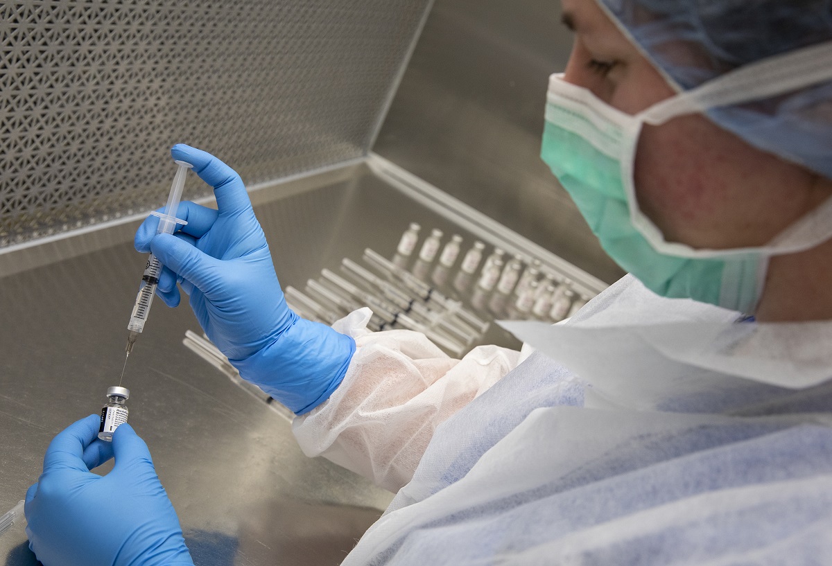 The First Injection Shot First shot: The COVID vaccine’s long trip from loading dock to first ...
