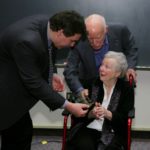 Lois Forney is presented with a crystal to recognize the launch of the Lois W. Forney Society, named in her honor.