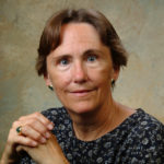 A head and shoulders professional portrait of Cara-Lynn Schengrund