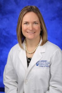 A head and shoulders professional portrait of April Armstrong