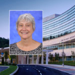 A head and shoulders professional portrait of Kristin Eckert against a background image of Penn State Cancer Institute