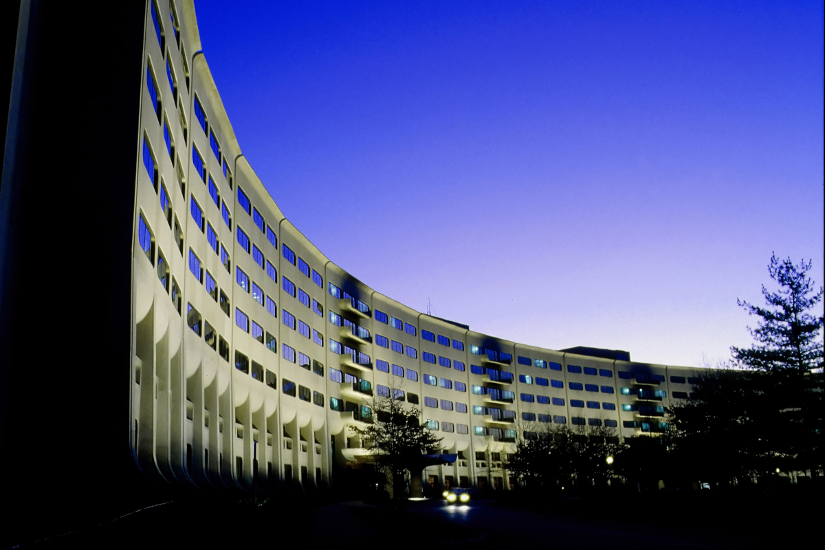 The crescent-shaped façade of Penn State College of Medicine is shown.