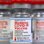 A closeup of Moderna COVID vaccine vials