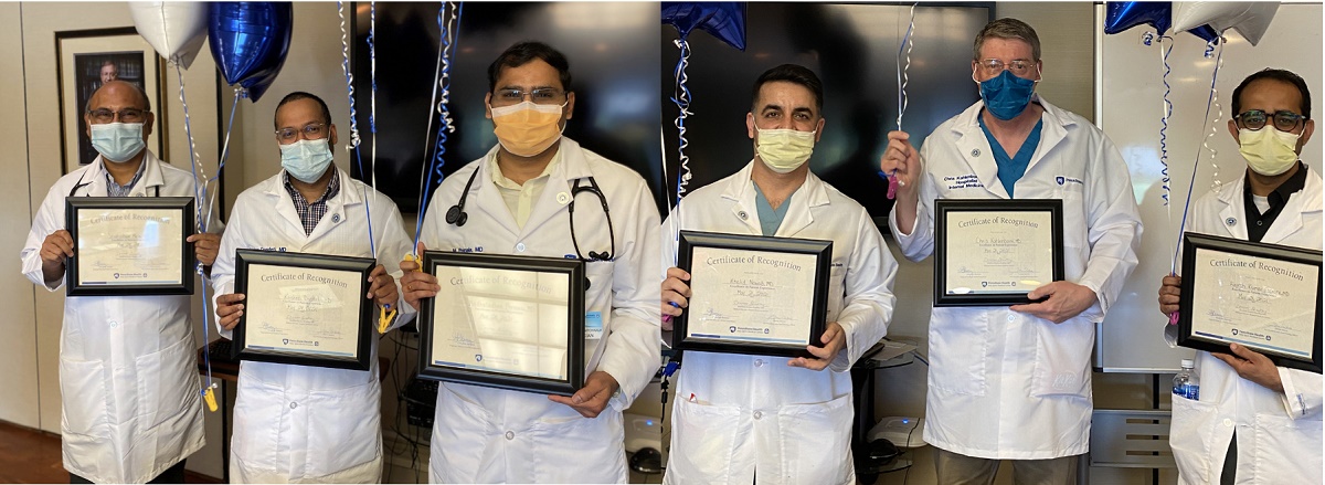 Holy Spirit Medical Center hospitalists from left Dr. Shahjahan Molla, Dr. Krishna Dondeti, Dr. Madhusudhan Ponnala, Dr. Khalid Nawab, Dr. Chris Kahlenborn and Dr. Rajesh Kumar Essrani wear the Penn State Health Patient Experience pins and hold the framed certificates and balloons they received as patient experience champions.