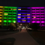 The LED lights on the Hershey Medical Center are lit up in a rainbow of colors.