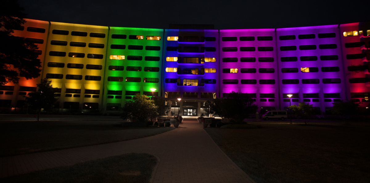 The LED lights on the Hershey Medical Center are lit up in a rainbow of colors.