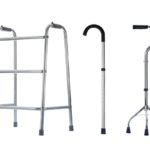 An aluminum walker and two aluminum canes, side by side