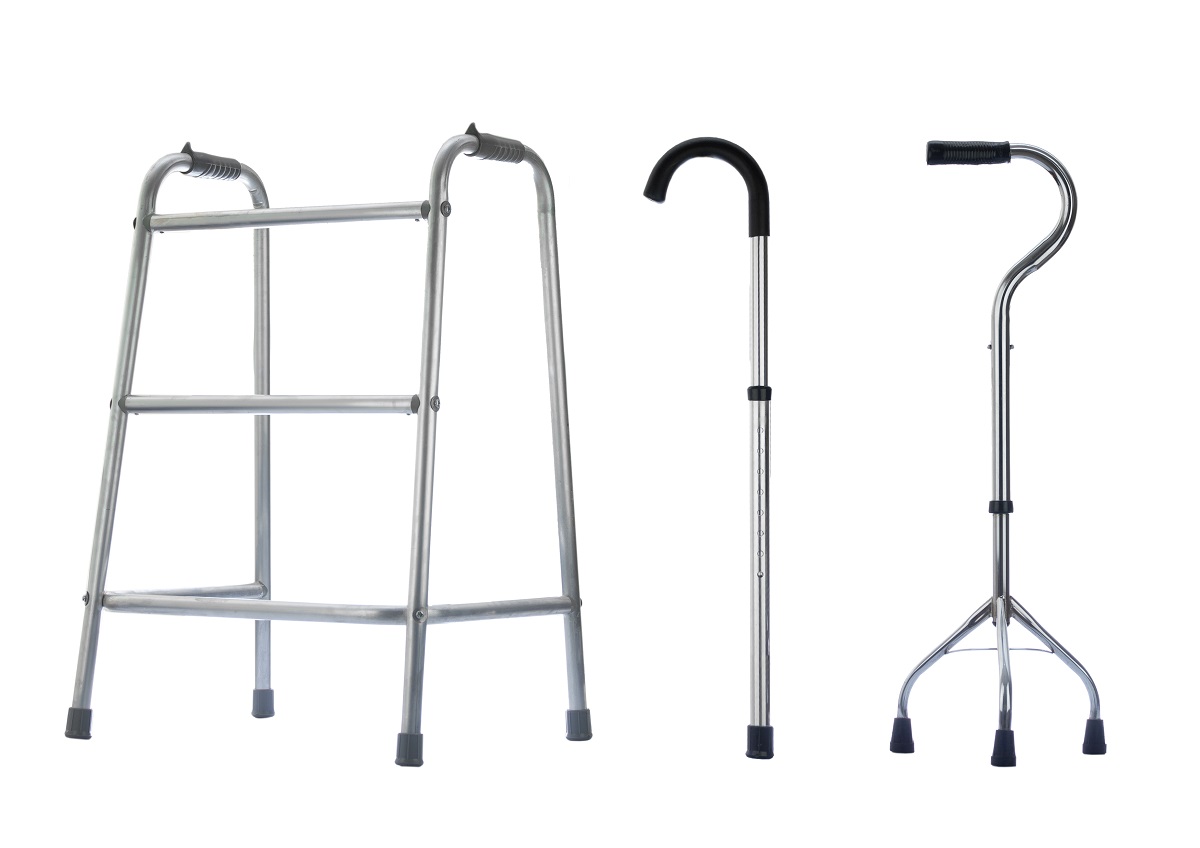 An aluminum walker and two aluminum canes, side by side