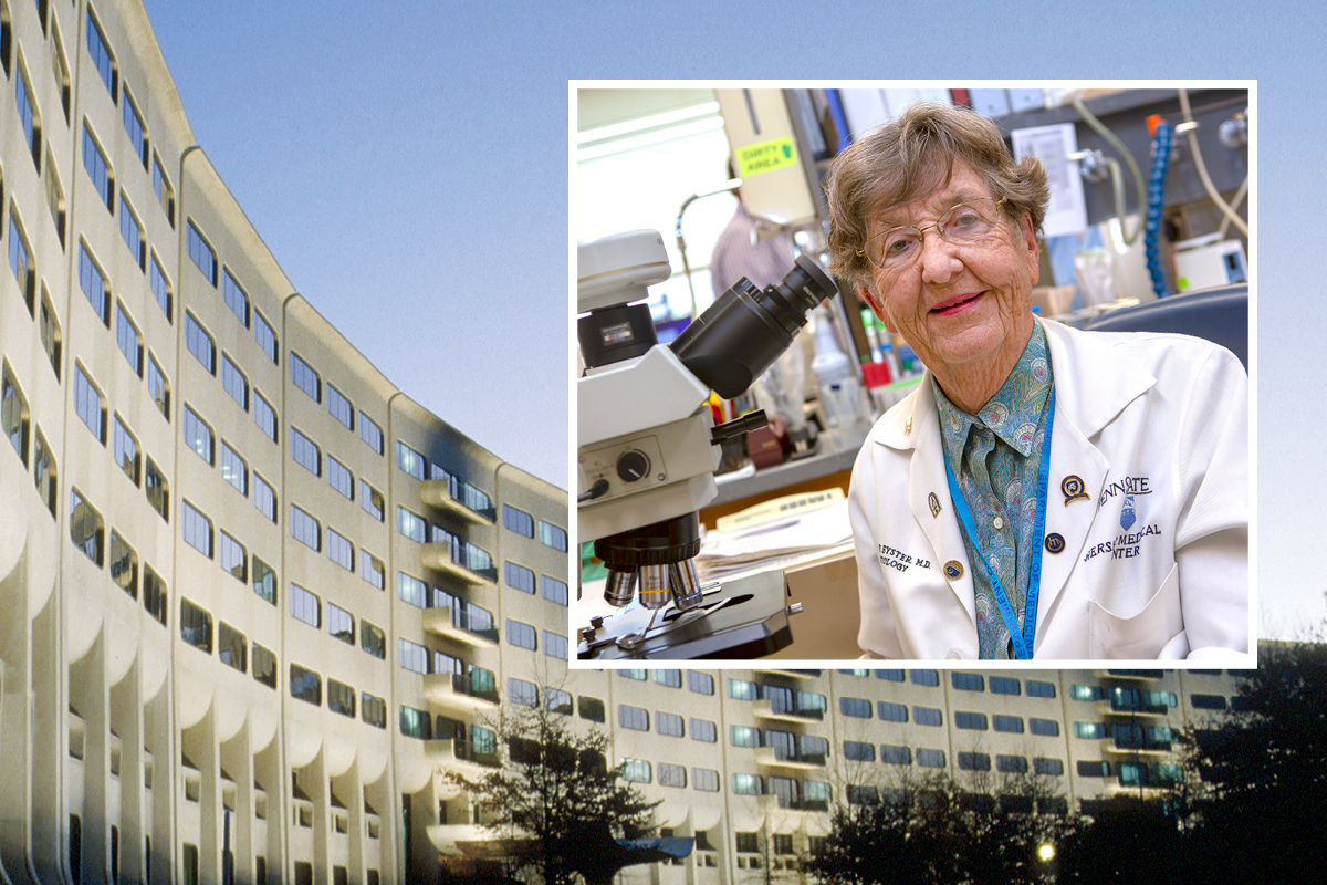 A portrait of Dr. Elaine Eyster in a laboratory by a microscope. The photo is placed against a background image of Penn State College of Medicine.