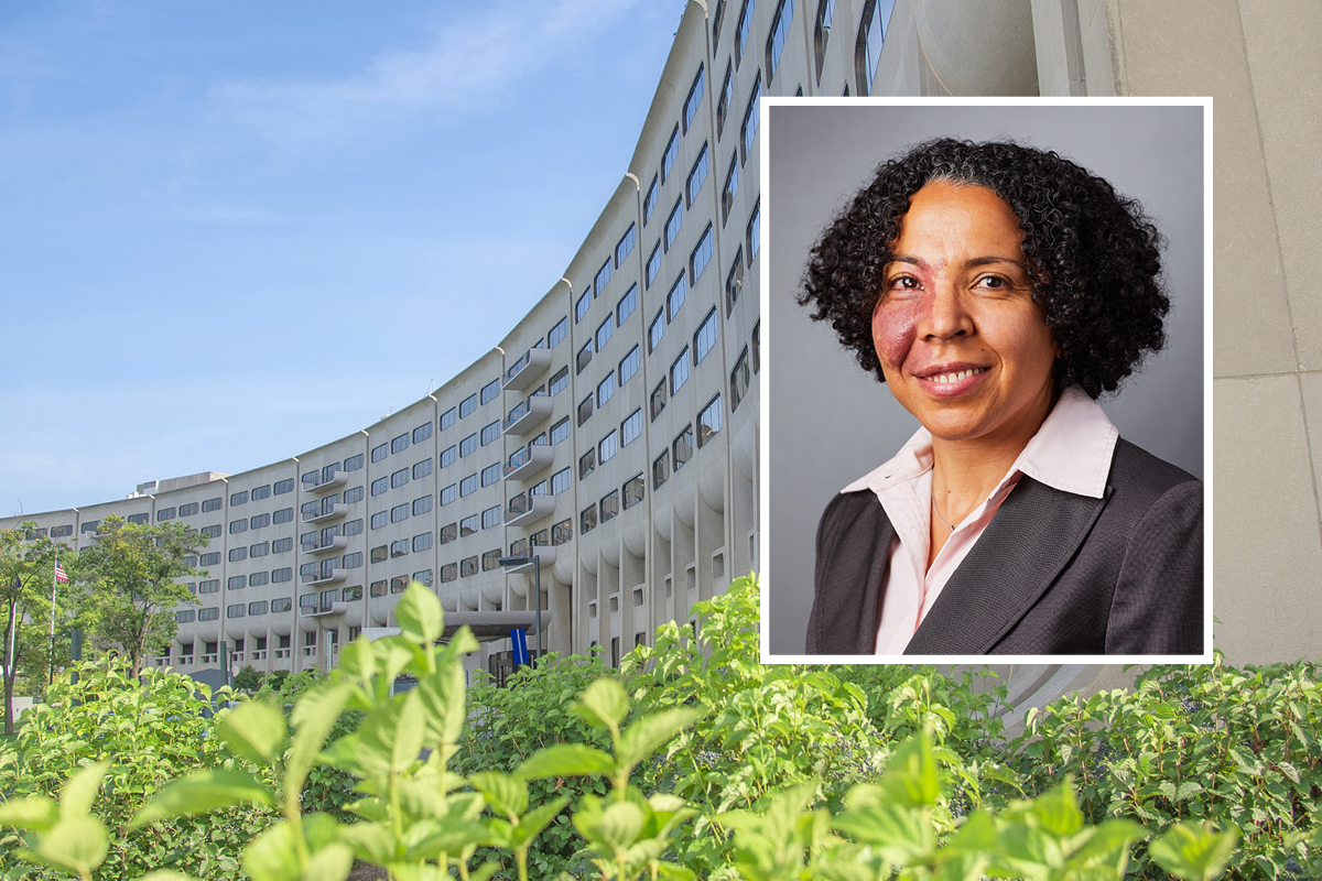 A head and shoulders professional portrait of Dr. Inginia Genao against a background image of Penn State College of Medicine.