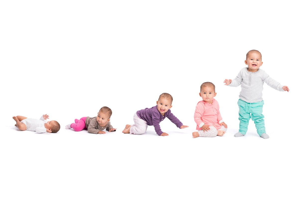 Baby development stages - baby laying, baby on stomach, crawling, sitting and finally standing.