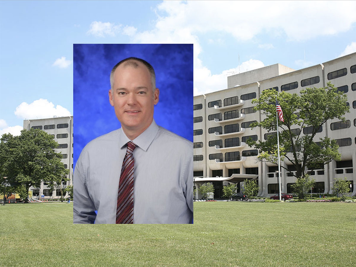 Photo of Douglas Leslie along with a photo of the Penn State College of Medicine.