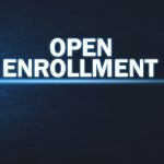 The words "open enrollment" in bold, underlined by a light beam