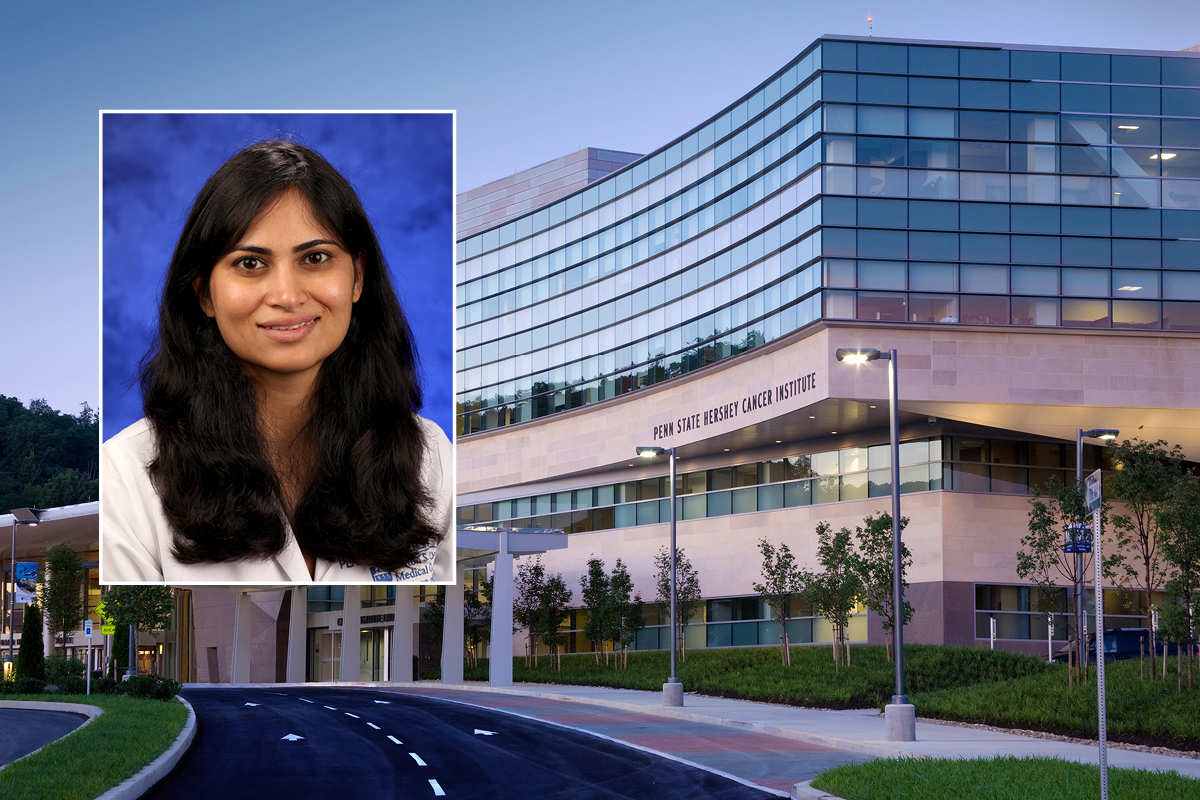 A head and shoulders professional portrait of Dr. Monali Vasekar against a background image of Penn State Cancer Institute.